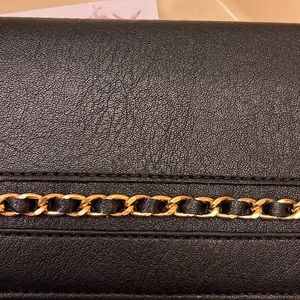 Jessica Simpson. Clutch.